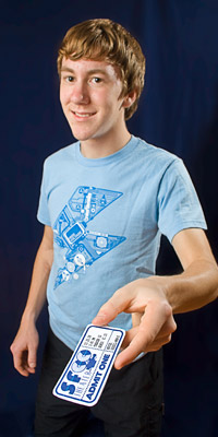 boy holding ticket